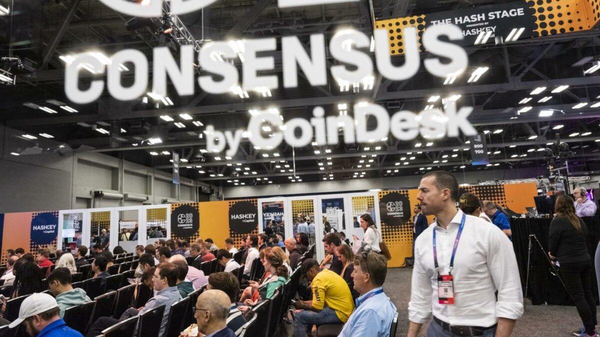 Attendees sit to watch a speech during the 2023 Consensus conference in Austin, Texas