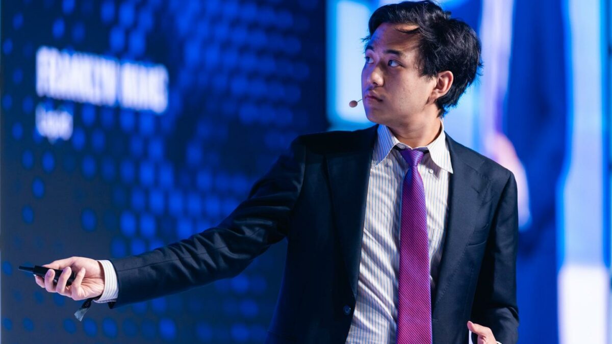 Liquid CEO Franklyn Wang speaks at a crypto conference